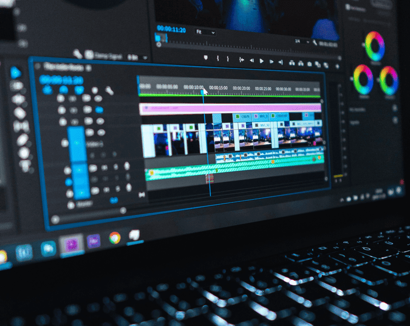 A laptop screen showing a video-editing timeline.